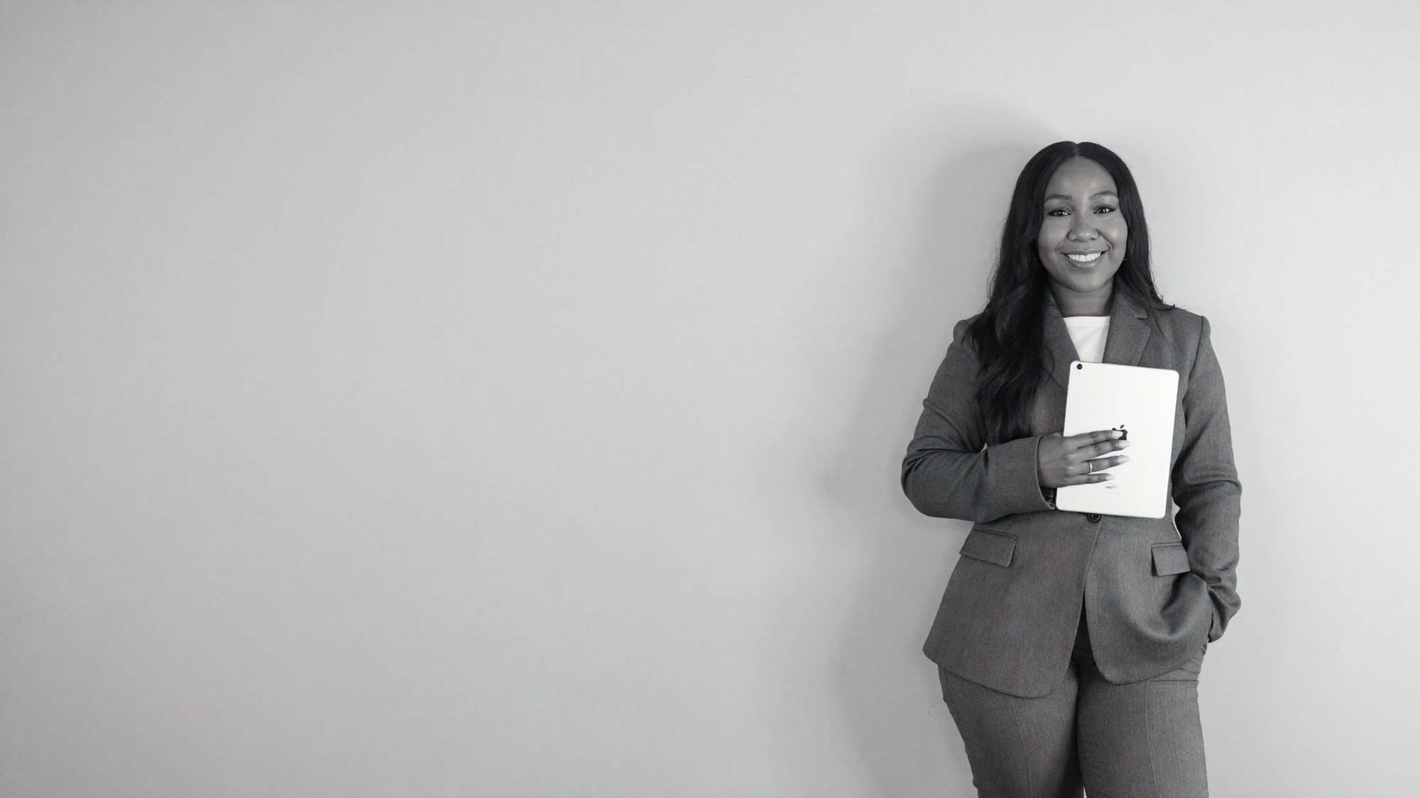 Rochelle holding an iPad